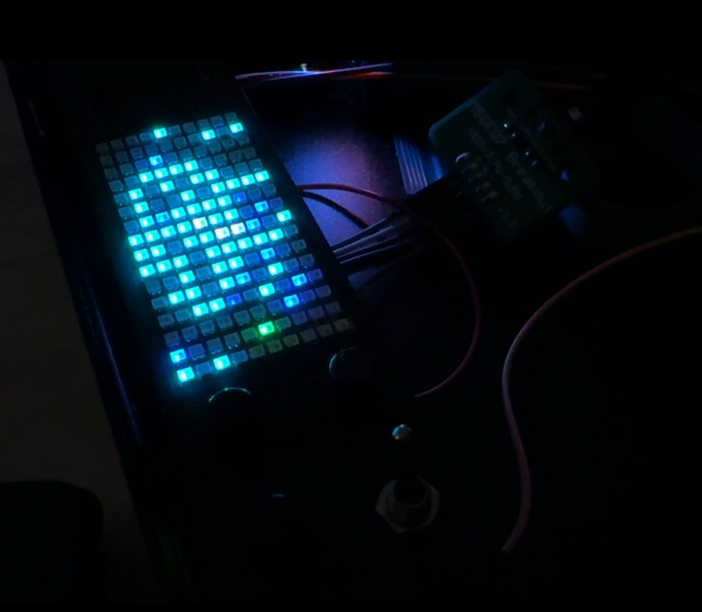 Cyan LED matrix pattern beside an MSGEQ7 breakout board