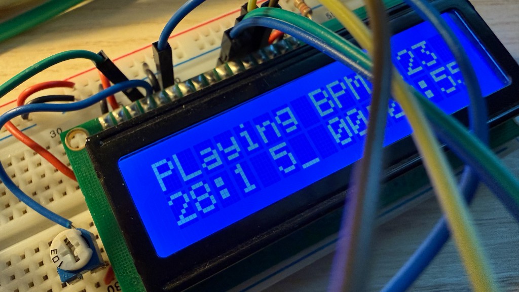 Breadboard 16×2 LCD showing MIDI BPM and song position